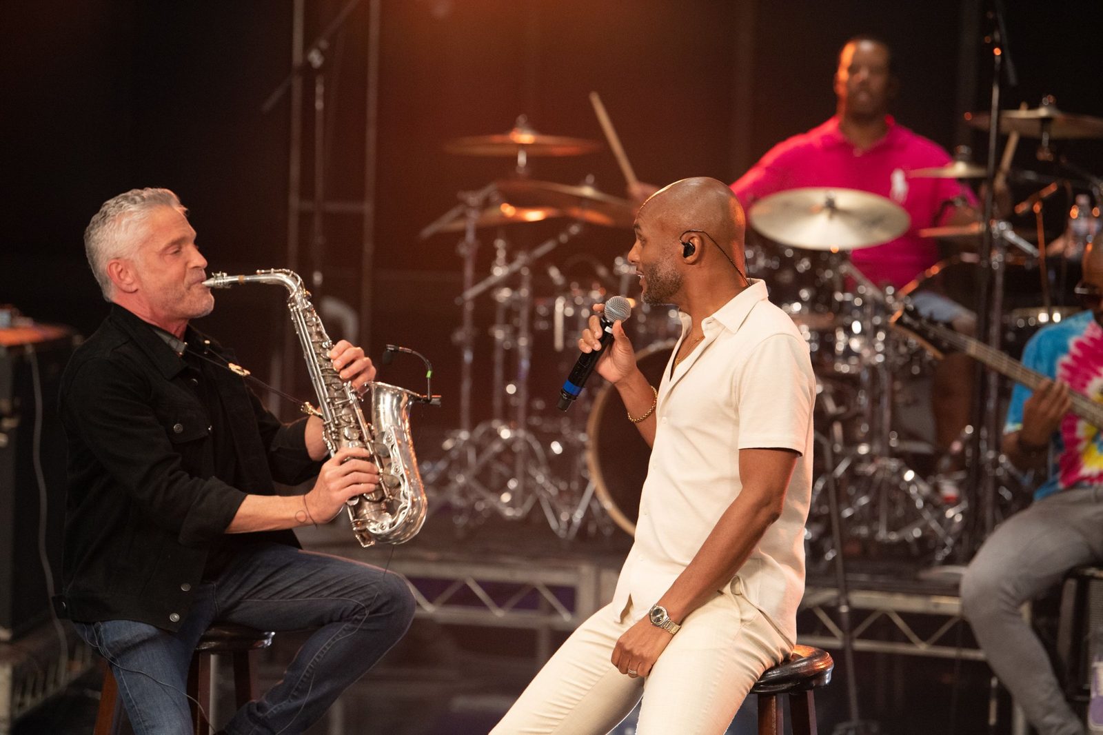 Saxophonist and vocalist performing with Nisan on drums