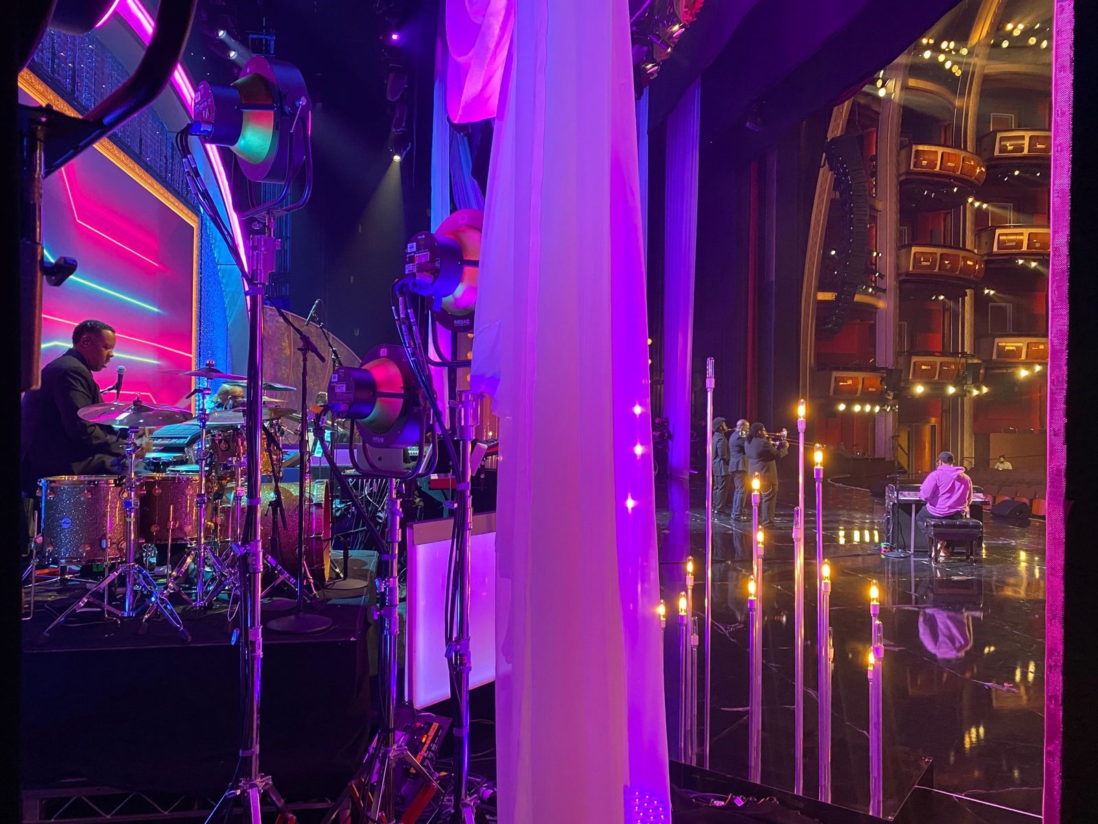 Nisan on drums side stage at a televised awards show